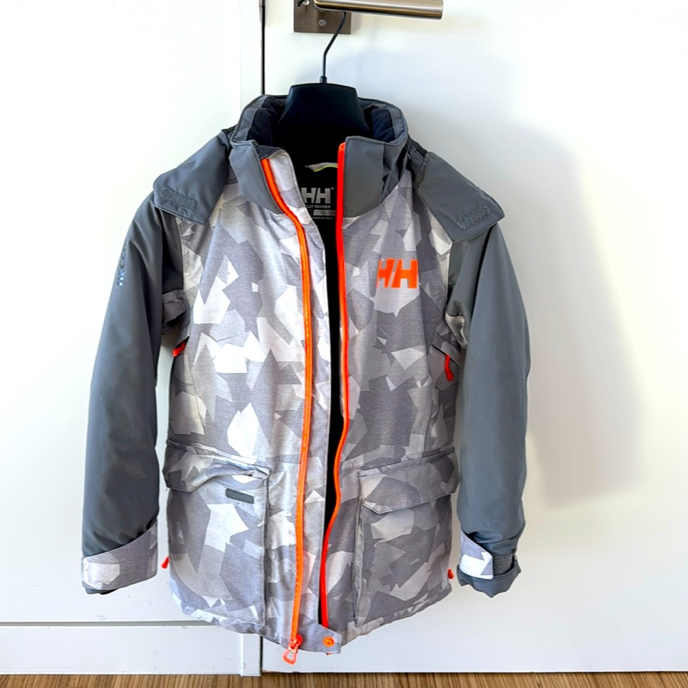 Helly Hansen youth ski coat with hood.